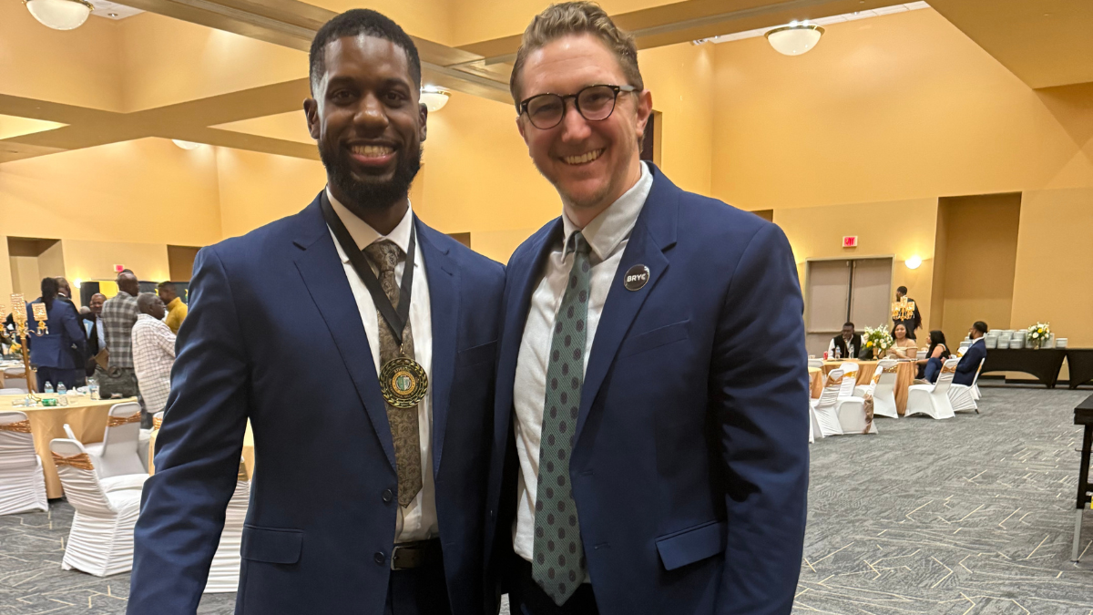 Alumnus Will Loyd with Lucas